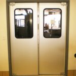 cased open frame with traffic doors